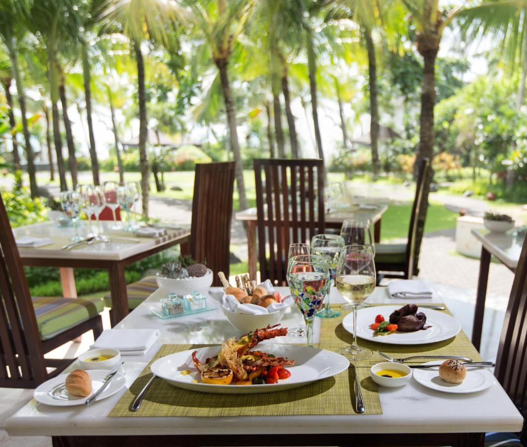 The Seminyak Beach Resort & Spa Екстериор снимка A table set for fine dining